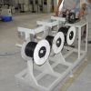 Máy cắt dây buộc sản phẩm
